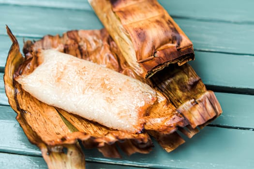 Thai traditional dessert. Grilled Taro Stuffed Coconut Sticky Rice