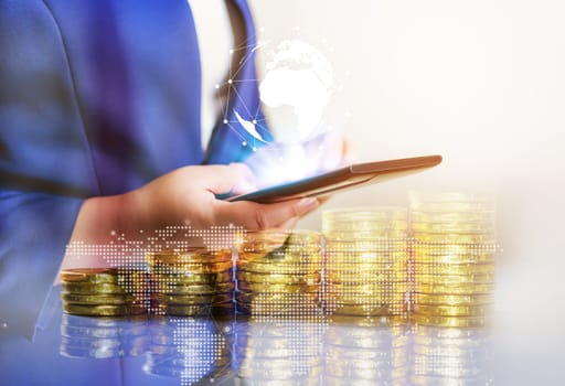 Double exposure online banking and internet banking and people networking account banking finance concept, Business women with laptop, phone, cellphone, tablet, smartphone mobile, and coin money on business office blurred background