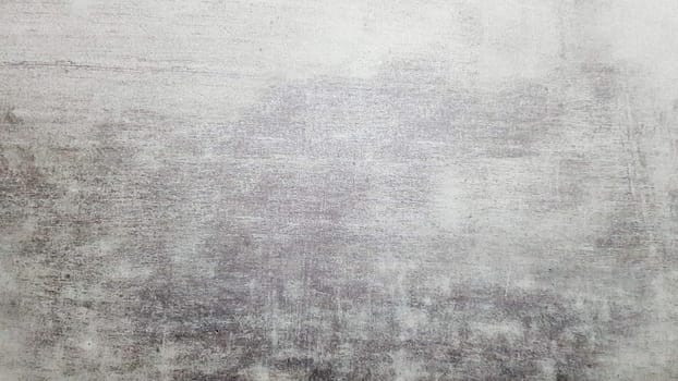 Natural gray slate stone background pattern. View from above. Copy space. Tile with a gray tint. Texture and seamless background.