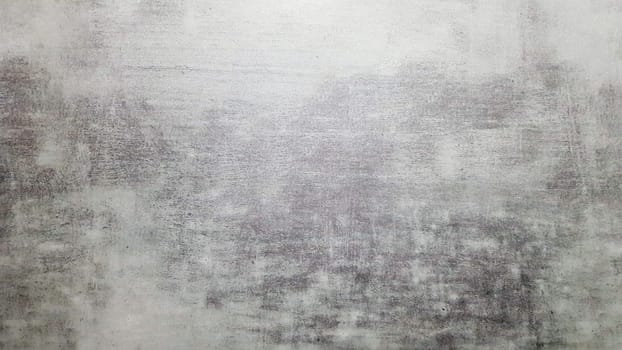 Natural gray slate stone background pattern. View from above. Copy space. Tile with a gray tint. Texture and seamless background.
