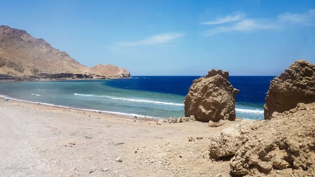 The Blue Hole is a popular diving spot in East Sinai. Sunny beach resort on the Red Sea in Dahab. A famous tourist destination near Sharm el Sheikh. Bright sunshine.