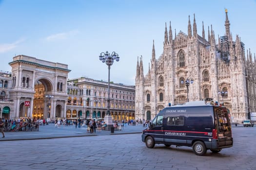 MILAN, ITALY - CIRCA SEPTEMBER 2019: Carabineer car, also named Carabinieri,  patrolling Milan City area in front of Mialn Cathedral. Surveillance and crime prevention.