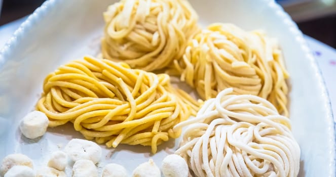 Rome, Italy. A closeup of traditional Italian cuisine. Preparation of delicious Bucatini pasta.