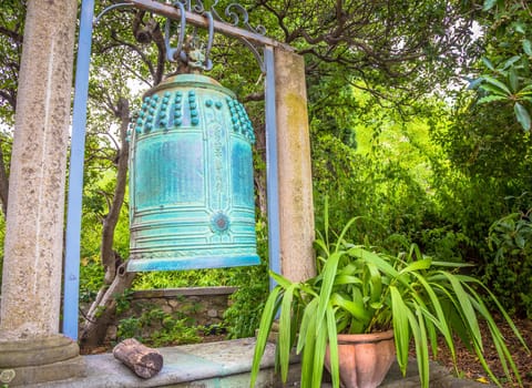 VENTIMIGLIA, ITALY - CIRCA AUGUST 2020: old Japanese bell located in Hambury Gardens and finely crafted in bronze. It seems to come from a Buddhist shrine destroyed by a fire in central Japan.