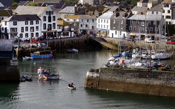 The town of Mevagissey Cornwall England with mackerel fishing boats in the harbour