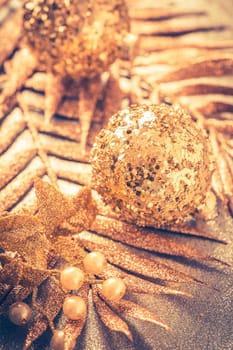 Christmas ornaments in golden tones