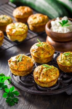 Homemade zucchini muffins with feta cheese, savory courgette with ingredients