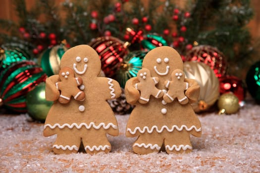 Gingerbread Family of 3 kids on Holiday Christmas Background