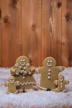Gingerbread Family of 4 kids on Holiday Christmas Background