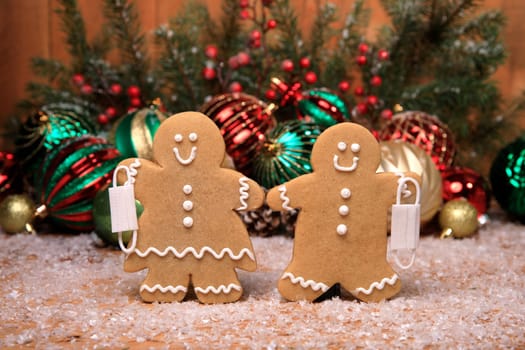 Gingerbread FamilyWith Covid Masks on Holiday Christmas Background