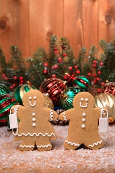 Gingerbread FamilyWith Covid Masks on Holiday Christmas Background