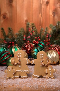 Gingerbread Family of 4 kids on Holiday Christmas Background