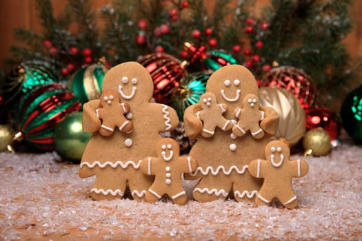 Gingerbread Family of 5 kids on Holiday Christmas Background