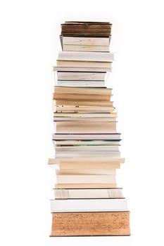 Pile of old and new books isolated on white background