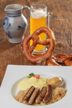 grilled nuremberger bratwurst with sauerkraut