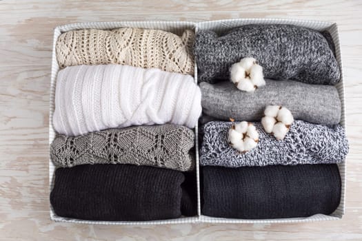 Homemade cosy sweaters in closet organizer with cottton, wool sweater for cold winter