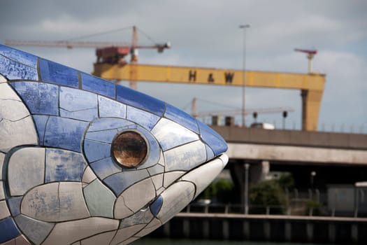 The Salmon of Knowledge Big Fish Donegall Quay in Belfast with Harland Wolff crane in the background