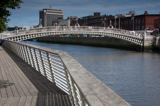 The Ha penny Bridge over the River Liffey in Dublin Ireland