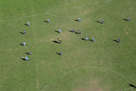 Children train football on a large football field in Velika Gorica, Croatia