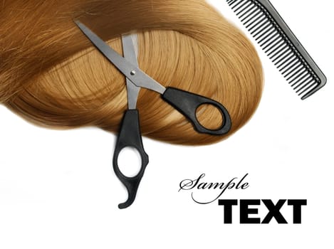 Long healthy blond hair and professional scissors over white