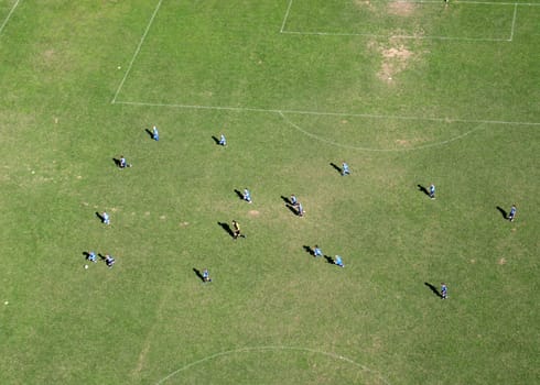 Children train football on a large football field in Velika Gorica, Croatia