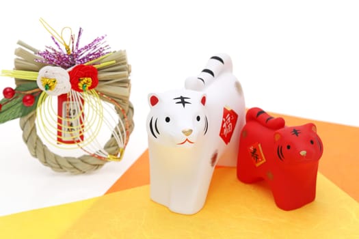 Dolls of Tora Tiger. Japanese new year card. Japanese new year tiger object. Japanese word of this photography means "fortune"""