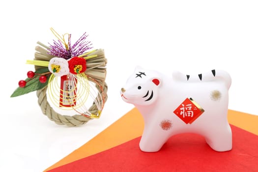 Dolls of Tora Tiger. Japanese new year card. Japanese new year tiger object. Japanese word of this photography means "fortune"""