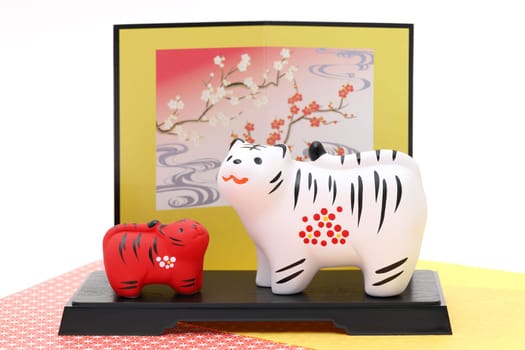 Dolls of Tora Tiger. Japanese new year card. Japanese new year tiger object