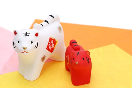 Dolls of Tora Tiger. Japanese new year card. Japanese new year tiger object. Japanese word of this photography means "fortune"""