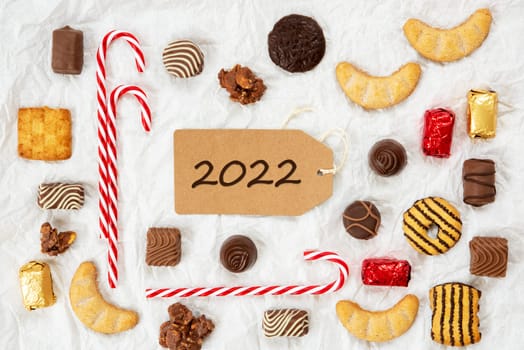 One Brown Label With English Text 2022. Christmas Candy Collection With Homemade Cookies.