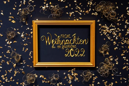 Frame With German Text Frohe Weihnachten Und Ein Glueckliches 2022 Means Merry Christmas And A Happy 2022. Golden Christmas Decoration And Ornament. Black Background With Glitter And Sparkle