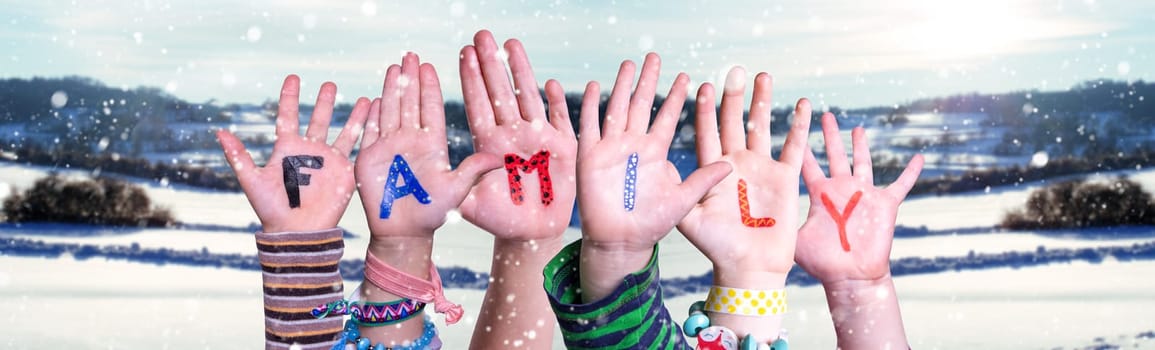 Children Hands Building Colorful English Word Family. Snowy Winter Background With Snowflakes