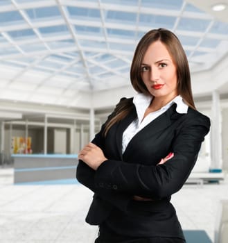 Smiling business woman in corporate building