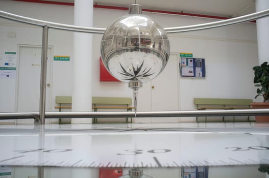 Badajoz, Spain - Sept 16th, 2019: Foucault pendulum at Faculty of Science. Galileo phrase written, And yet it moves. Badajoz Campus