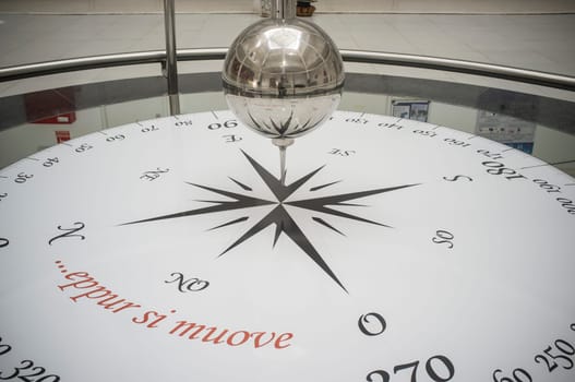 Badajoz, Spain - Sept 16th, 2019: Foucault pendulum at Faculty of Science. Galileo phrase written, And yet it moves. Badajoz Campus