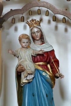 Virgin Mary with child Jesus, statue in the church of Our Lady of the Snows in Volavje, Croatia