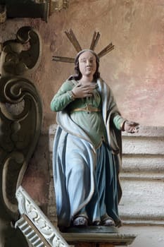 Statue of a saint on the altar of St. Three Kings in the church of Our Lady of the Snows in Volavje, Croatia
