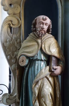Statue of a saint on the altar of St. Stephen in the church of Our Lady of the Snows in Volavje, Croatia