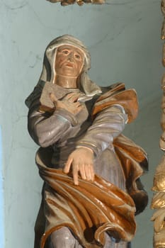 Saint Anne statue on the main altar at Our Lady of the Snows Church in Volavje, Croatia