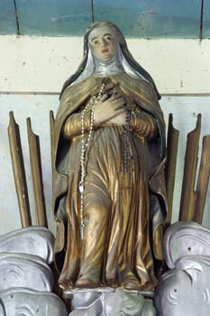 Statue of saint on the altar of St. John of Nepomuk in the church of Our Lady of the Snows in Volavje, Croatia