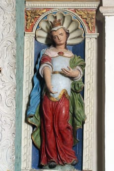 Saint Lucia, statue on the altar of St. Mary in the church of Our Lady of the Snows in Volavje, Croatia