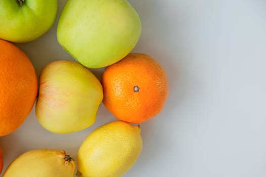 Fruits lie on a white background. High quality photo