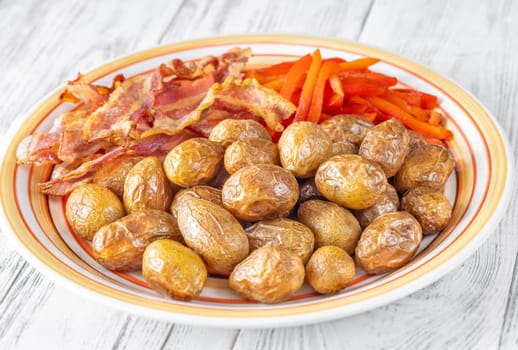 Golden potatoes, smoky bacon, and roasted peppers create a savory, flavorful dish