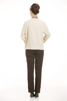 In a variety of occupation clothing cleaners stand in front of a white background