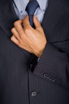 detail of a Business man suit with blue tie