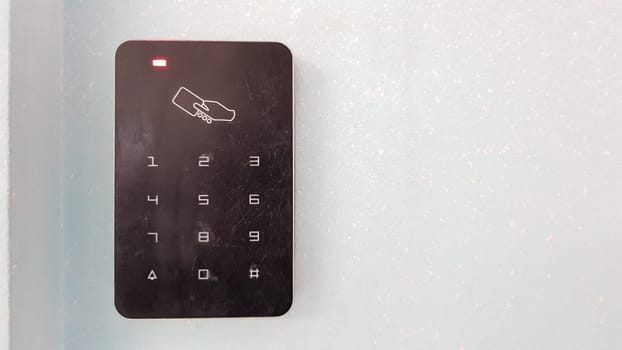 Electronic lock on the wall with copy space. Digital security systems for door security. Selective focus