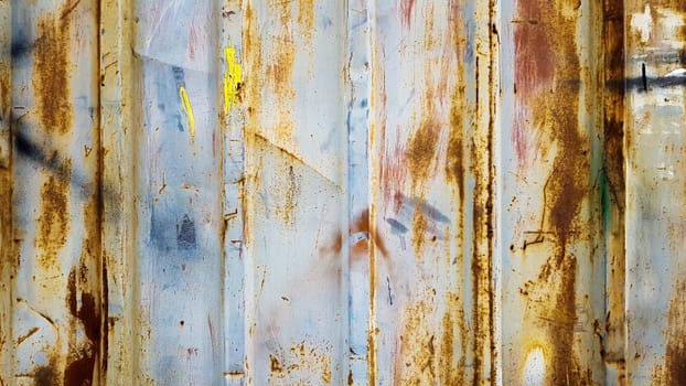 Rusty galvanized sheet. Corrugated metal wall texture, zinc old metal wall background, vintage style, abstract.