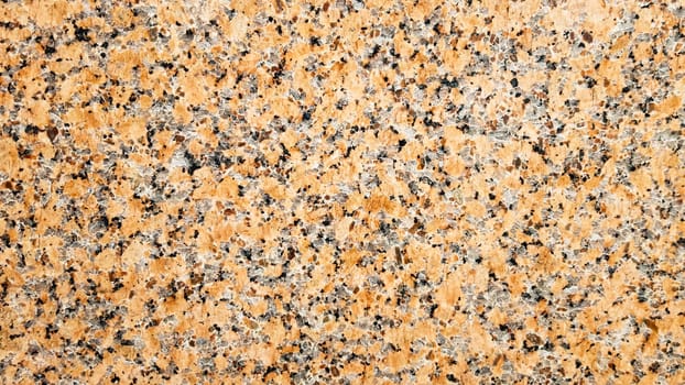 Real natural brown granite pattern, polished mineral slice. Seamless cracked marble damaged concrete texture. Architectural background. Brown spots on a stone background. marbling.