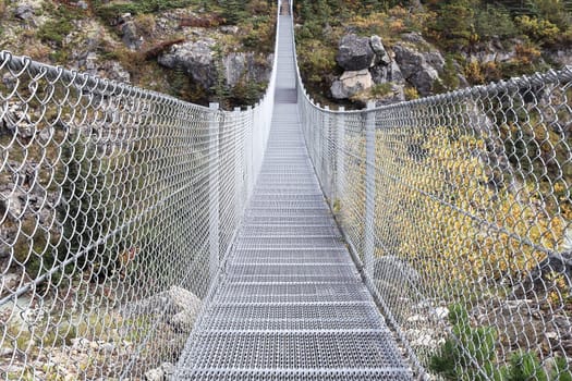 View of the edge of a suspension bridge.