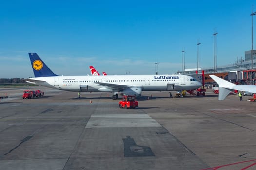 Hamburg, Germany - March 20, 2014: Lufthansa aircraft at new Terminal in Hamburg ready for boarding.